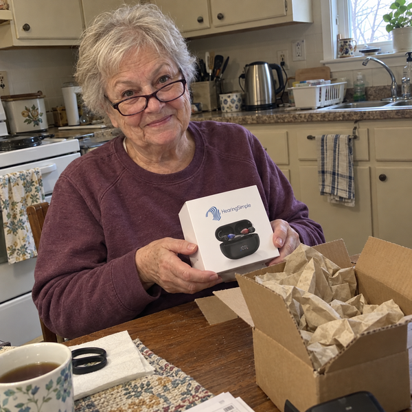 Customer unboxing Hearing Simple hearing aids at home